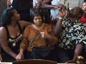 Terina Allen, sister of Samuel DuBose, sits with family members as she reacts in the courtroom following the arraignment of former University of Cincinnati police officer Ray Tensing at Hamilton County Courthouse for the shooting death of motorist DuBose. Photos: AP World Wide Photo